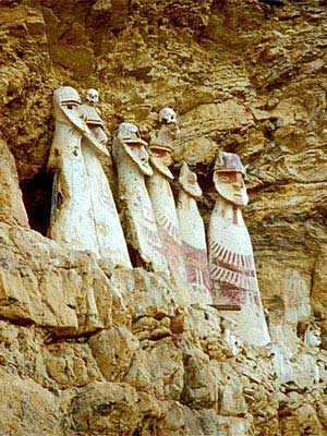 Chachapoyas sarcophagi, located in a cliff-side tomb, overlooking the valley below.