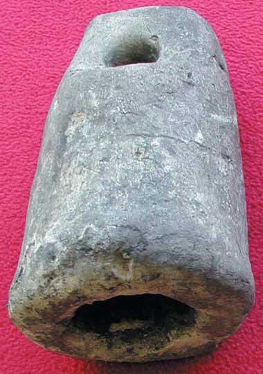 This sounding lead would be filled with tallow, attached to a line, and thrown over the side of the boat. The line length and debris stuck to the tallow would indicate water depth, which could be a key navigational tool, especially at night or during bad weather conditions.