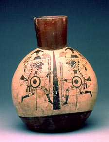 Moche warrior vessel from the Larco Museum. Unfortunately, you’ll have to travel there to see the bean pots as they don’t have any published photos of the lima bean paintings on their website.