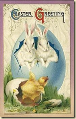A card showing symbols of Easter: rabbits, eggs and chicks